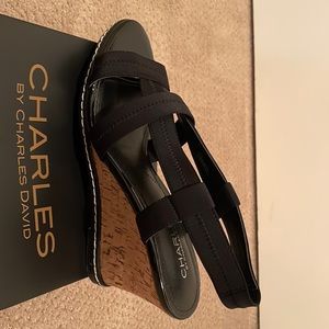 Like new in box. Never worn. Strappy black sandals w/cork wedge 3.25” heel